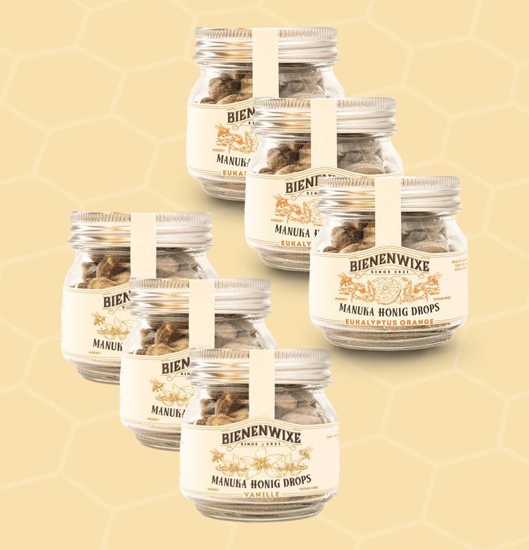 Bienenwixe Manuka Honig Drops in den Sorten Vanille und Eukalyptus Orange – stilvoll verpackt in Gläsern mit Vintage-Etiketten.